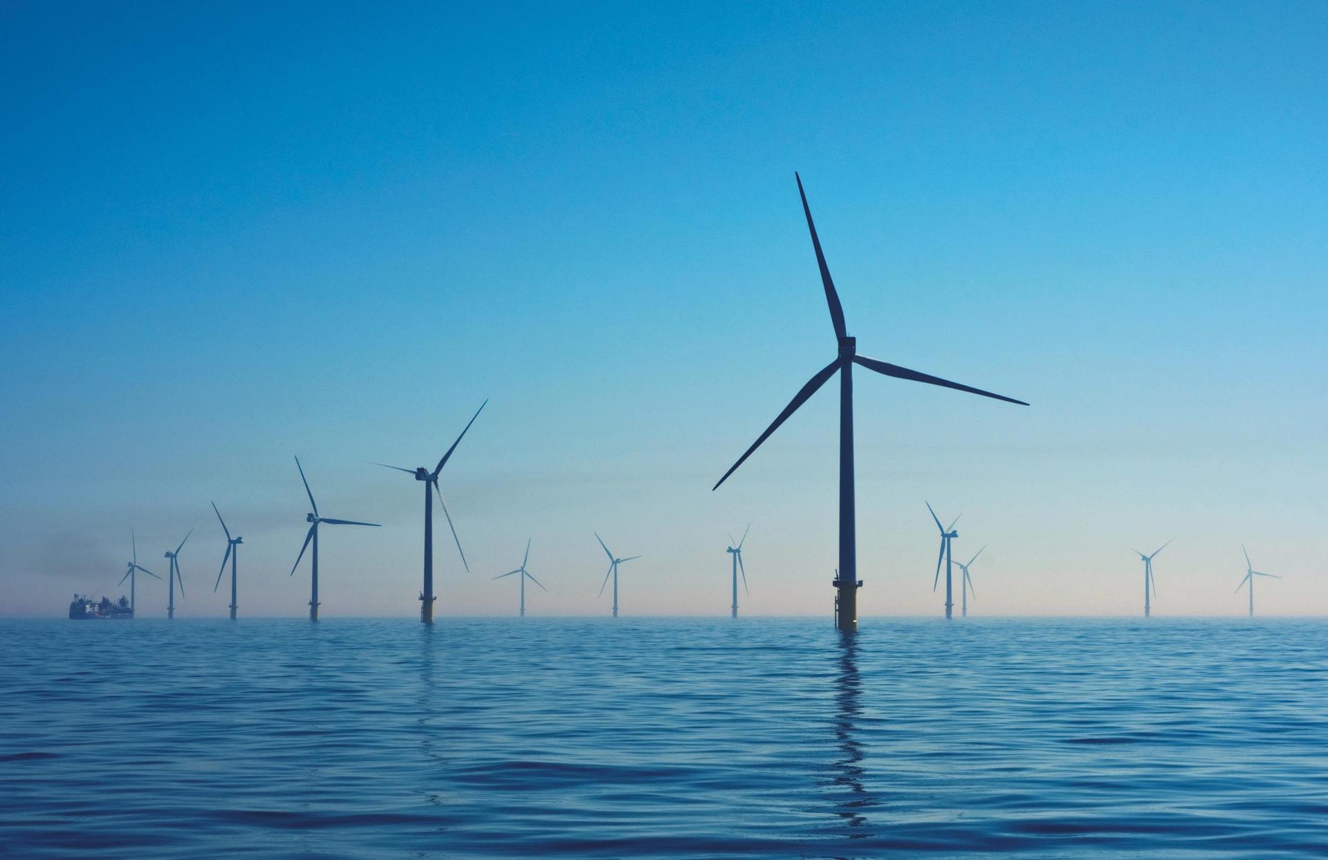 Offshore wind farm under blue sky